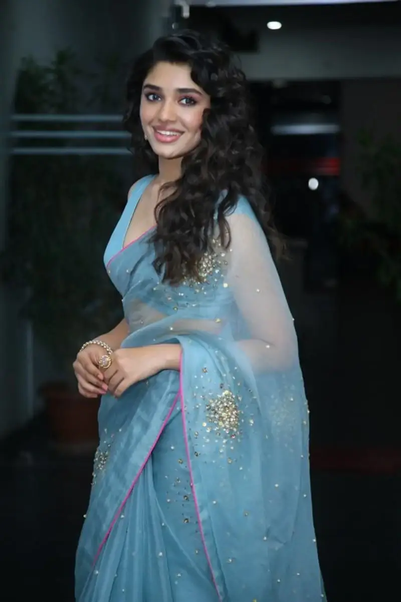 INDIAN ACTRESS KRITHI SHETTY IN BLUE SAREE AT TELUGU MOVIE PRESS MEET 7